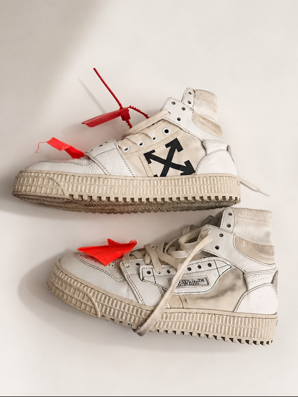 Off-White Cream/White High-Top Sneakers with Red Zip-Tie Accents